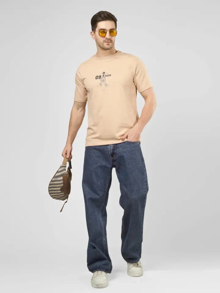 Dirt Rider French Terry T-Shirt in Sand, shown on model
